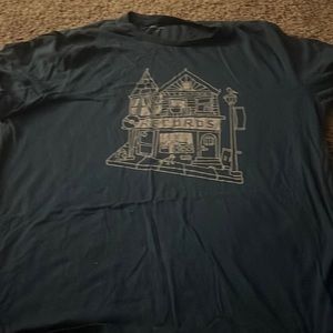 A green graphic shirt